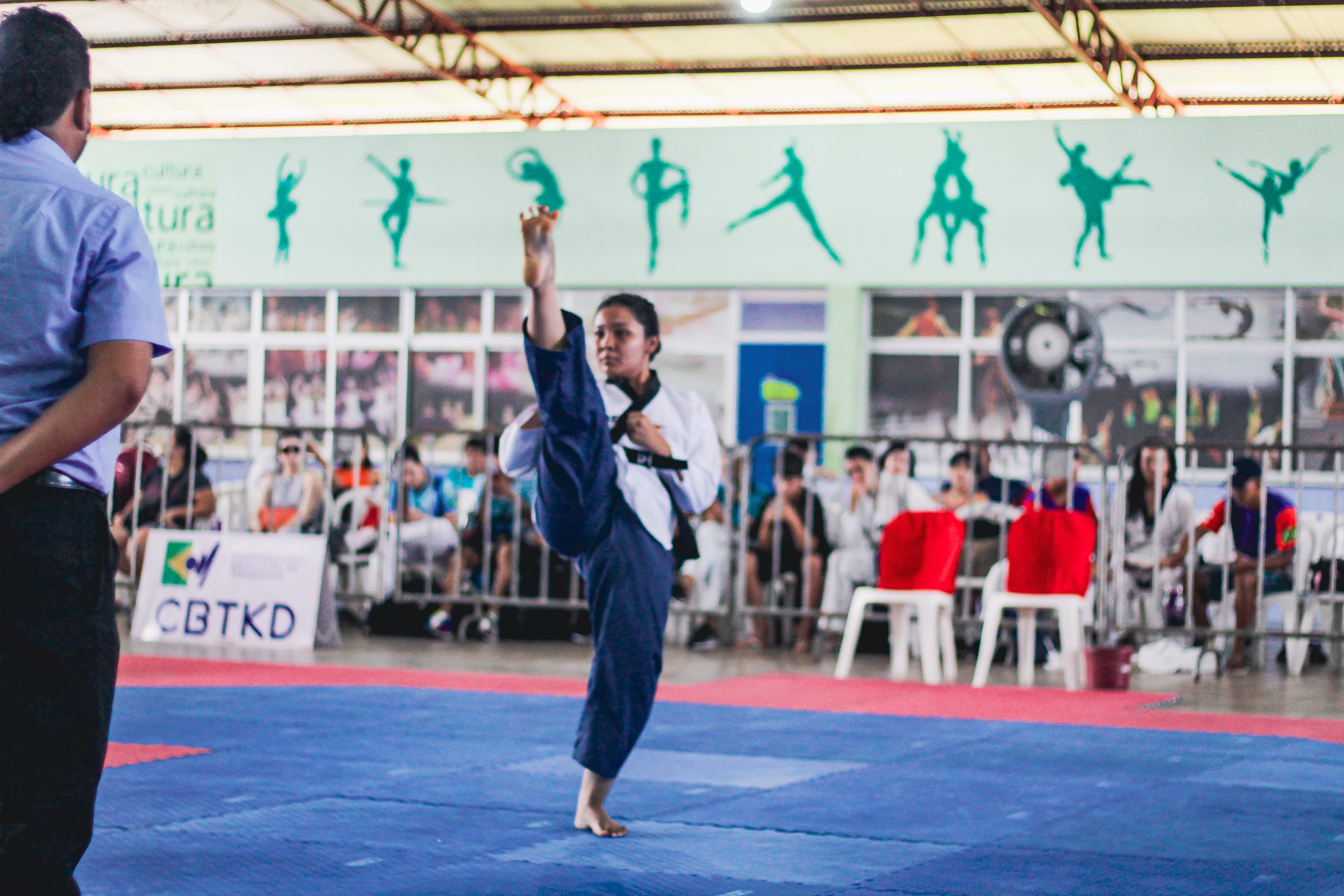 Taekwondo athlete performing a kick